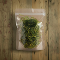 Approved jalapeño bag on the clean catalog wood background
